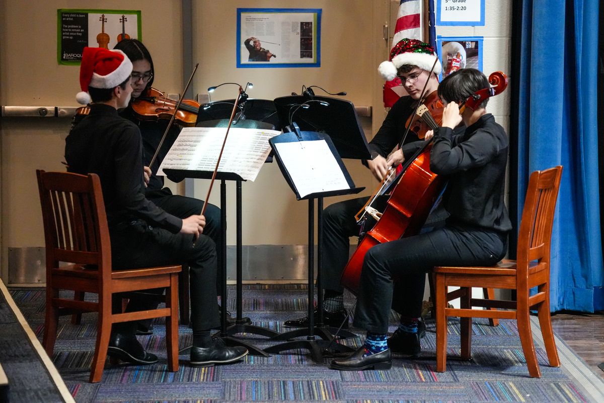 Turpin Orchestra students perform a song