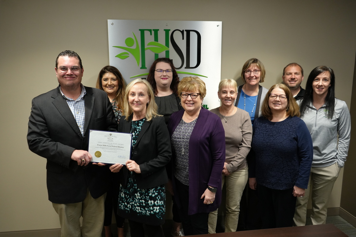 Group posing with FHSD Finance Award