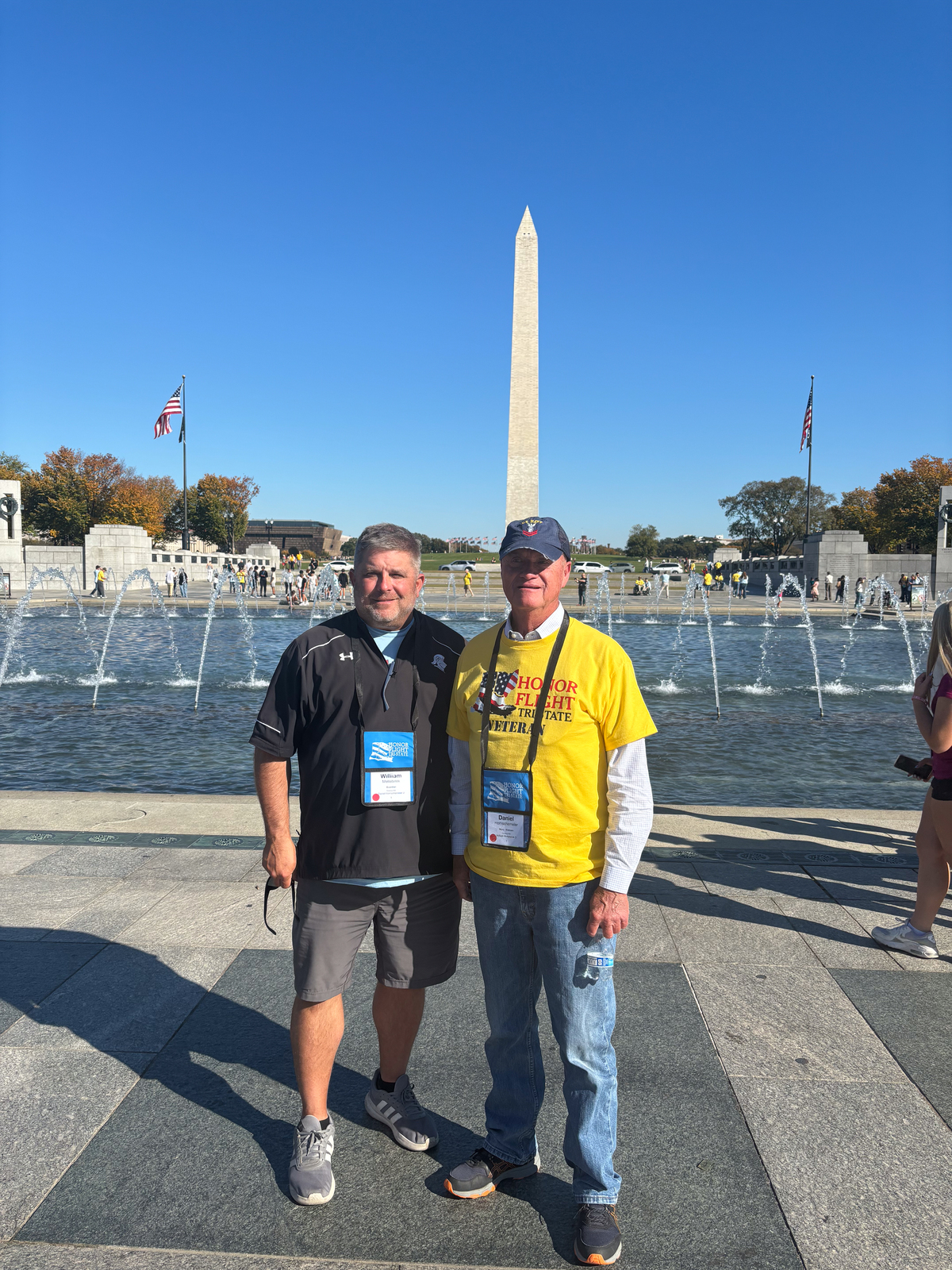 Hornschemeier and Meltebrink pose for a photo in front of the Washington Monument