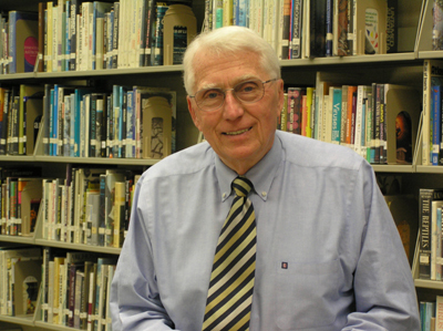 Dr. Patzwald in library