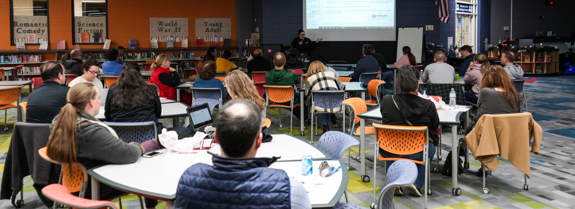 Family members participate in a Parent Academy session